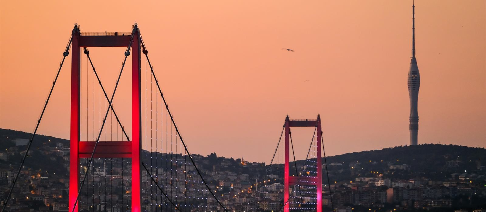 Bosphorus Bridge at dusk with Çamlıca TV Tower in the background, Istanbul