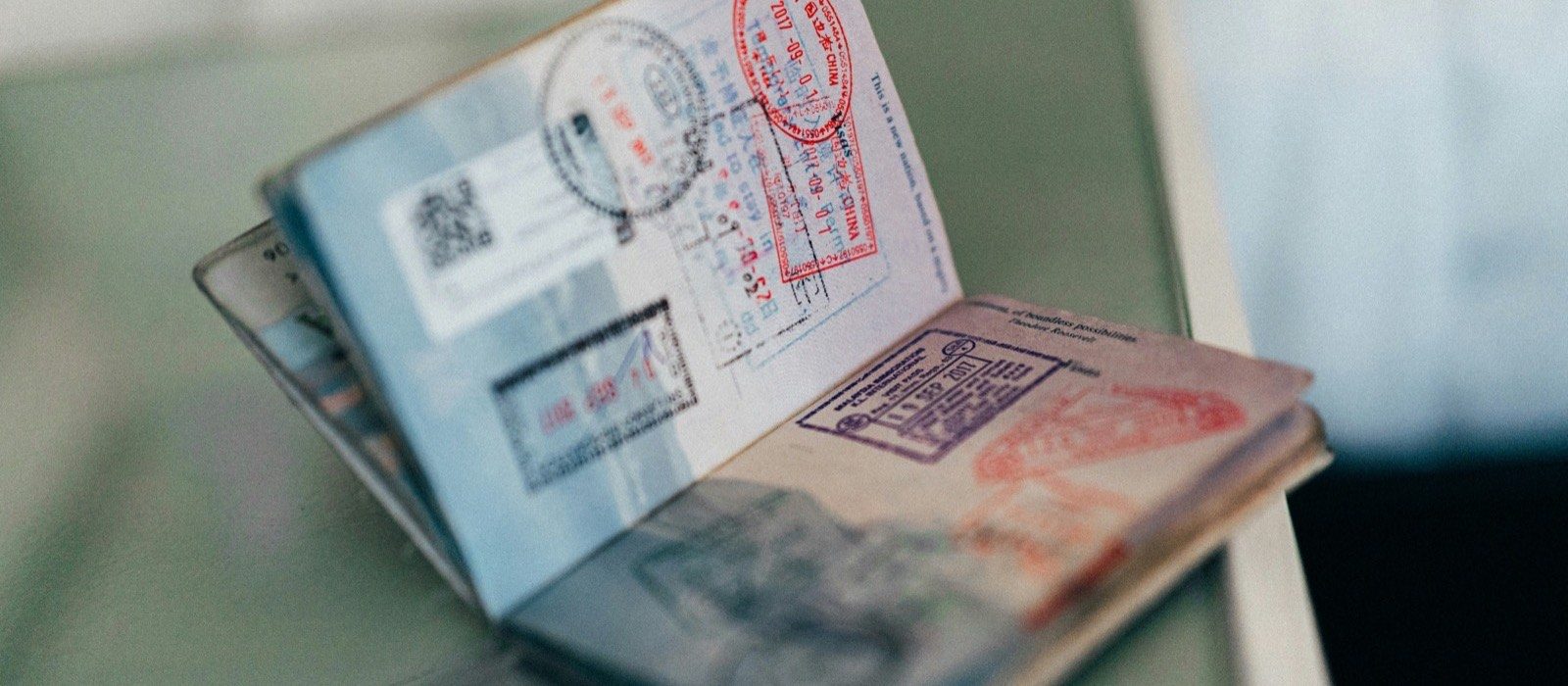 Passport with multiple international visa stamps